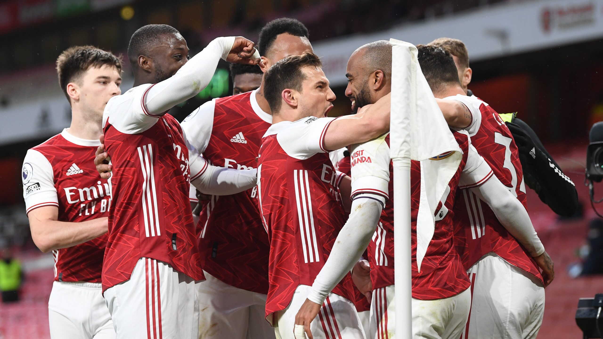 Gunners fight back to shutter 10-man Spurs top-four hopes