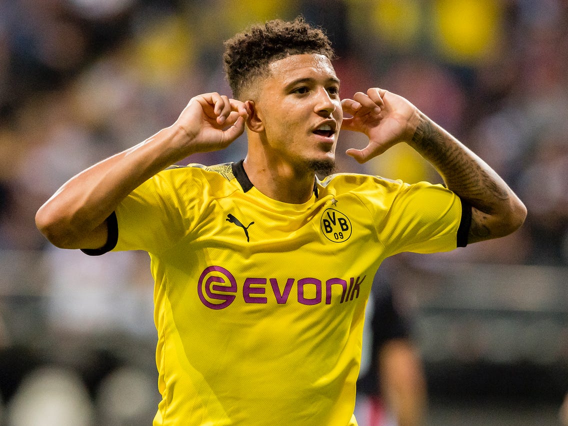 Jadon Sancho looks happy in first picture since Manchester United deal announced